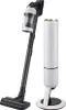 A cordless stick vacuum cleaner and its charging stand are displayed against a white background. Voir les images du produit