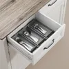 An open kitchen drawer with a cutlery organizer filled with silverware. Náhľad obrázku produktu