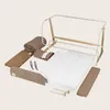 A disassembled baby bed and its components laid out on a light gray background. Náhľad obrázku produktu