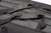 A close-up view of the straps and stitching on a dark gray bag. Produktbild-Vorschau