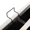 A close-up view of the metal frame and fabric upholstery of a bed. Náhľad obrázku produktu