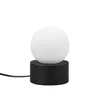 A black and white table lamp with a spherical shade. Náhľad obrázku produktu