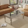 A living room scene with a couch, coffee table, and books. Anteprima dell’immagine prodotto