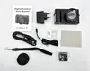 A flat lay of a digital camera and its accessories, including a user manual, charger, cables, memory card, cleaning cloth, wrist strap, lens cap, and battery. Náhľad obrázku produktu