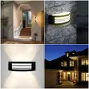 Collage of four images showing outdoor wall lights in different settings. Anteprima dell’immagine prodotto