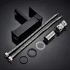 A black faucet and its components are laid out on a black surface. Produktbild-Vorschau