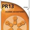 A close-up view of hearing aid batteries on their packaging. Náhled obrázku produktu