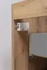 A close-up view of a drawer slide mechanism attached to a wooden cabinet. Produktbild-Vorschau