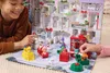 Children playing with a PAW Patrol advent calendar and toys. Podgląd zdjęcia produktu