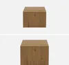 Two identical wooden cube-shaped coffee tables are shown against a white background. Produktbild-Vorschau