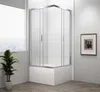 A modern bathroom with a shower enclosure and a plant. Náhľad obrázku produktu