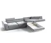 A sectional sofa with its pull-out bed feature extended, shown against a white background. Produktbild-Vorschau