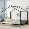 A child's bedroom with a house-shaped bed.