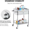 A stainless steel medical cart with various laboratory items on it, with a close-up inset showing a detail of its construction. Podgląd zdjęcia produktu