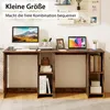 A desk with a computer, laptop, and books, set against a white wall with a pegboard display. Produktbild-Vorschau