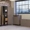 A storage cabinet and other storage solutions are shown in a garage or workshop setting. Voir les images du produit