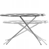 A foldable ironing board shown from a side angle against a white background. The ironing board has a patterned cover and metal legs. Produktbild-Vorschau