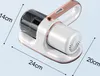 A white and rose gold handheld vacuum cleaner is shown on a light blue background with dimensions indicated by arrows and text. Produktbild-Vorschau