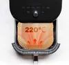 An air fryer basket with a paper liner, showing a temperature of 220°C and heat waves emanating from the bottom. Produktbild-Vorschau