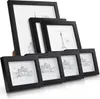 A set of black picture frames of various sizes arranged in a staggered formation. Produktbild-Vorschau