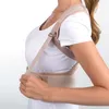A woman wearing a white t-shirt and a beige back support brace. Anteprima dell’immagine prodotto