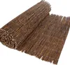 A rolled-up privacy screen made of natural materials. Produktbild-Vorschau