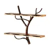 A two-tiered shelf unit designed to look like a tree branch, made of metal and wood. Náhled obrázku produktu