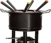 A black fondue pot set with fondue forks on a white background. Podgląd zdjęcia produktu