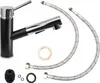 A black and chrome kitchen faucet with two flexible hoses and some small accessory parts, laid out on a white background. Náhled obrázku produktu