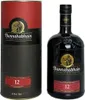 A bottle of Bunnahabhain 12 Year Old Islay Single Malt Scotch Whisky and its presentation tube, displayed against a white background. Produktbild-Vorschau
