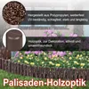 A garden border made of brown palisades in front of a flower bed with pink and yellow flowers, with rain falling. Náhled obrázku produktu