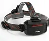 A black headlamp with an orange and gray patterned strap against a white background. Podgląd zdjęcia produktu