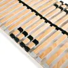 A close-up view of a wooden bed slatted base. Produktbild-Vorschau
