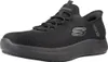 A black Skechers shoe is shown from the side against a white background. Voir les images du produit