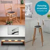 A collage of images showing different uses of seat cushions, including a dining chair, a bar stool, and a bench. Produktbild-Vorschau