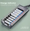 A battery charger with multiple AA and AAA batteries inserted. Náhľad obrázku produktu