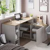 A home office setup with a corner desk by a window. Anteprima dell’immagine prodotto