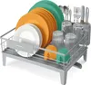 A dish rack filled with plates, cups, and cutlery. Produktbild-Vorschau