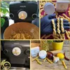 A collage of images showing pasta making equipment and ingredients. The top left shows a pasta maker with pasta being extruded into a bowl. The top right shows pasta being held by a gloved hand. The bottom left shows the pasta maker again with a different  Produktbild-Vorschau