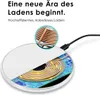 A cutaway view of a white wireless charger showing its internal coils and circuitry, with a close-up inset of the copper coils. Produktbild-Vorschau