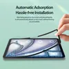 A hand is shown applying a screen protector to a tablet. Voir les images du produit