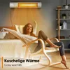 A woman is relaxing in a rocking chair in front of a bed, with a wall-mounted infrared heater above her. Náhled obrázku produktu
