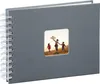 A grey spiral-bound photo album with a square window on the cover showing a family flying a kite. Produktbild-Vorschau