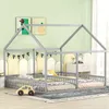 A children's house bed with two mattresses, decorated with a garland of flags and a toy car in front. Náhľad obrázku produktu