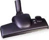 A dark gray vacuum cleaner floor head is shown from a slight diagonal angle against a white background. Anteprima dell’immagine prodotto