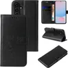 A collage of images showing a black flip phone case with floral and butterfly designs, and a phone inserted into it. Produktbild-Vorschau