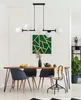 A dining room scene with a table, chairs, and a chandelier. Náhled obrázku produktu