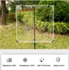 A clear tarp is set up outdoors in a garden setting, supported by poles. Below the tarp, there is a section with icons and text describing product features. Voir les images du produit