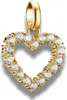 A close-up studio shot of a gold heart-shaped charm pendant with clear stones, set against a white background. Voir les images du produit