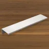 A silver handle is placed on a wooden surface. Produktbild-Vorschau